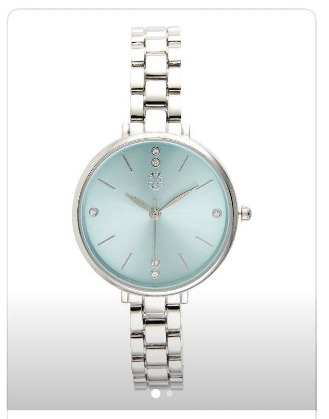 CL montre argent fond bleu