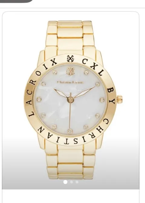 Montre or fond blanc Christian Lacroix