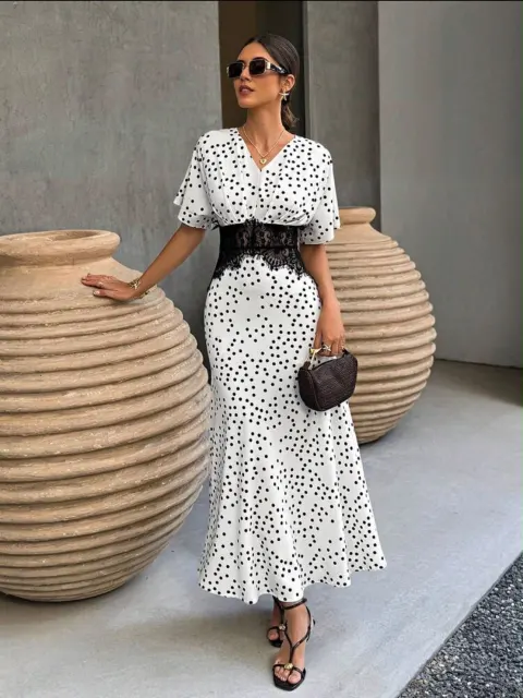 Robe à pois blanche noire dentelle